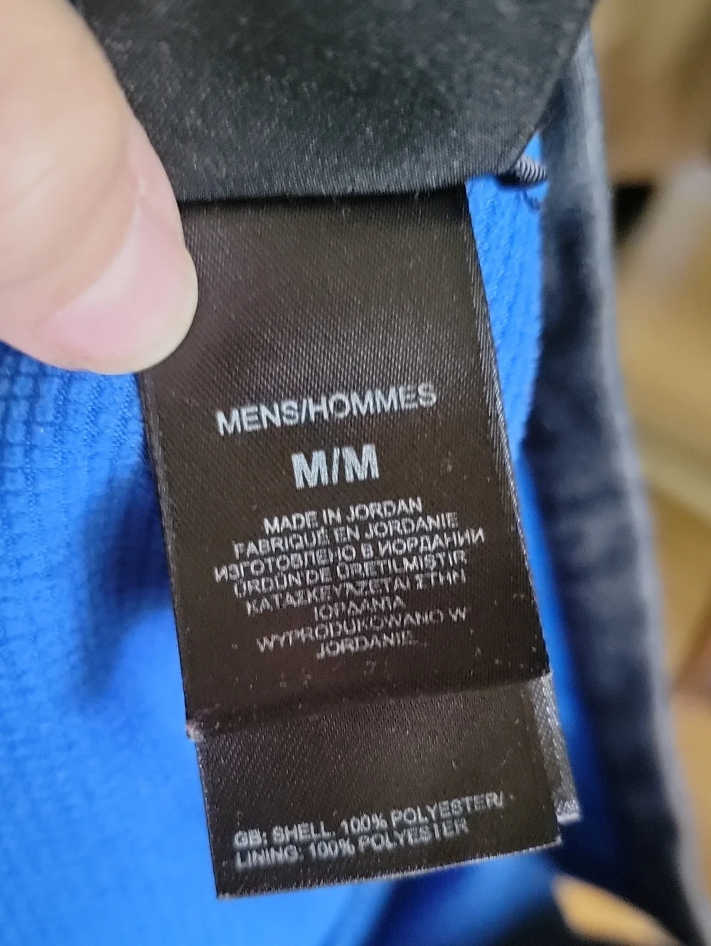 The North Face Black Jacket with Blue Accents